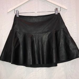 Black faux-leather mini skirt